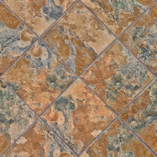 Pose de carrelage dans une pièce en cours de rénovation